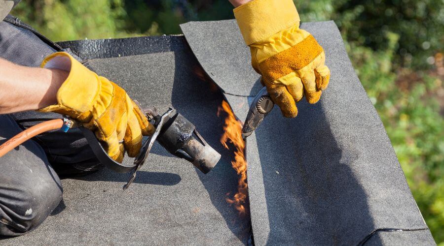 Expert tile roof repair services in Versailles, IL